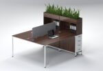 Face-to-face 2-person workstation in walnut wood with white drawers and top planter box.