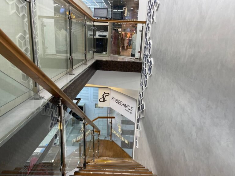 Wooden staircase with glass railing