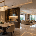 Luxurious open-plan dining and living room interior design by Ultimate Designs Ltd with modern chandeliers and marble flooring.